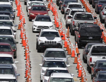 Cars line up for coronavirus testing outside of Hard Rock Stadium in Miami Gardens, Fla. Florida is one of many states reporting spikes in COVID-19 cases in recent days, as the number of confirmed cases worldwide tops 10 million.