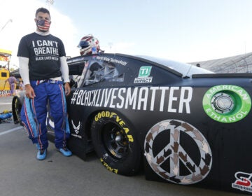 NASCAR driver Bubba Wallace waits for the start of a Cup Series auto race in Martinsville, Va., on June 10.