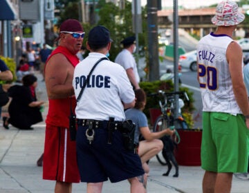 A Fishtown resident chats with a police officer during the 'End Racism Now' gathering on June 9, 2020. (Domenic Malandro/Darkside Media, LLC) 