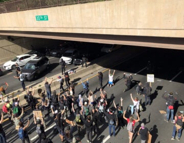 Protesters face off with police during a demonstration on I-676 in Philadelphia on Monday, June 1 (Courtesy of Pilar Goñalons Pons)