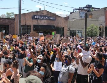 Hundreds of protesters gather at Eastern State Penitentiary