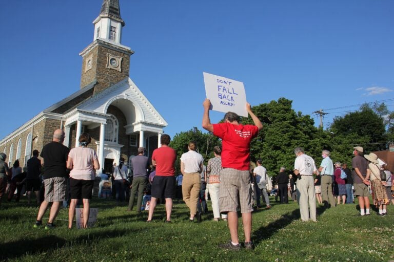 Hundreds gather at Oxford Presbyterian Church in Northwest Philadelphia for an interfaith vigil
