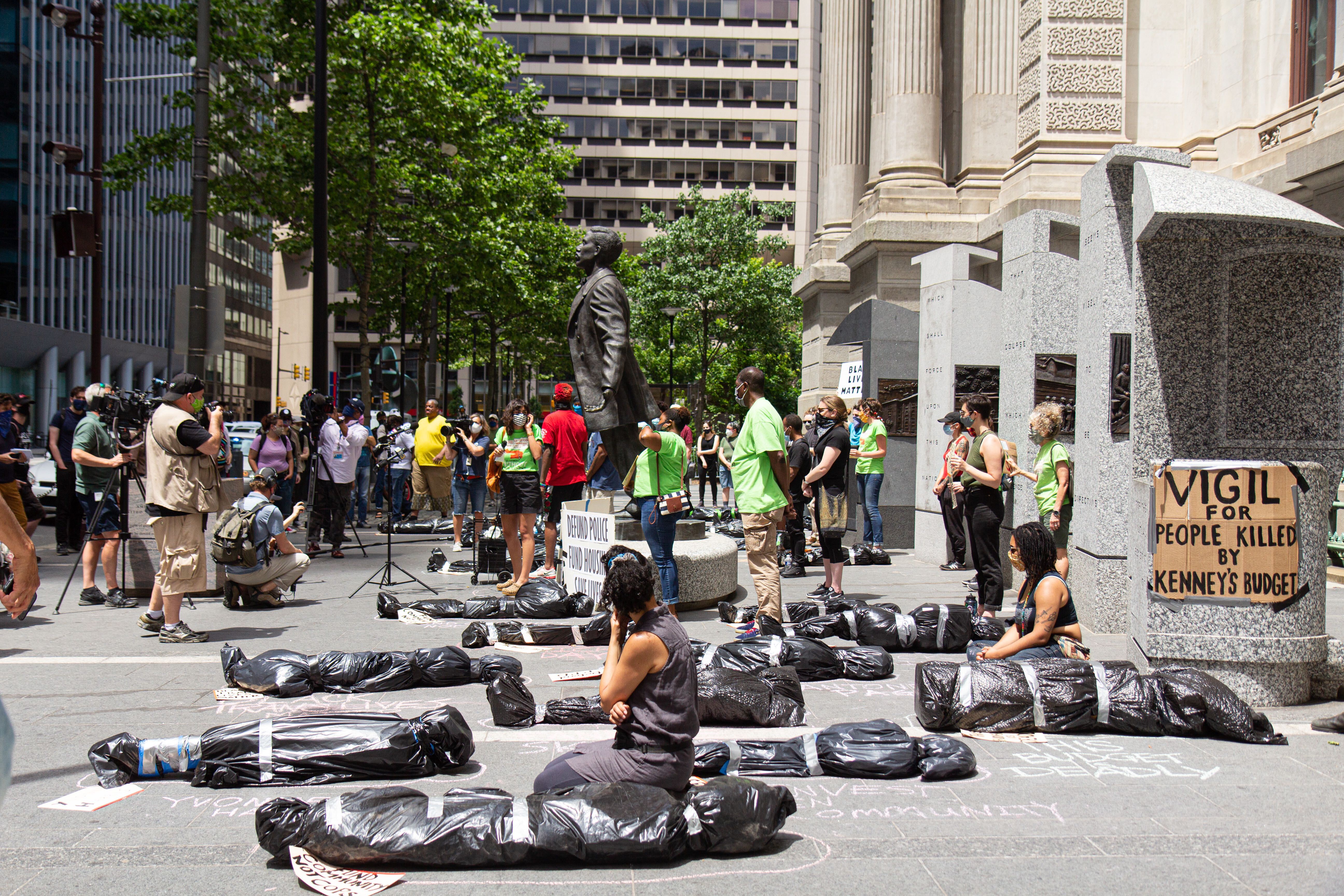 Activists with the Philadelphia Coalition for Affordable Communities and others held a “Vigil for People Killed by Kenney’s Budget” at City Hall, demanding the city defund the police and fund affordable, accessible and integrated housing.