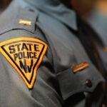A close-up of a New Jersey State Police Officer's uniform