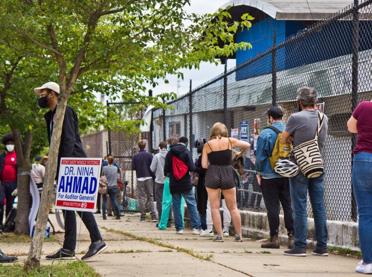 Voters wait in line outside a polling place in Philadelphia.