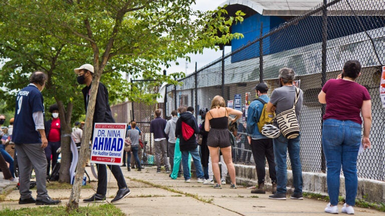 Voters wait in line outside a polling place in Philadelphia.