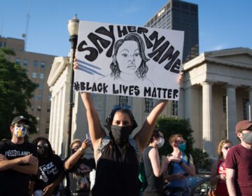 Marissa Pantoja, 23, made this protest sign as a tribute to Taylor. 