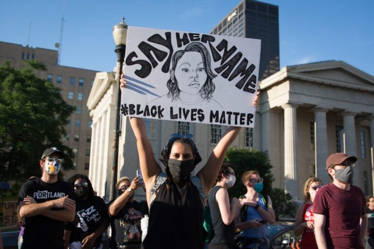 Marissa Pantoja, 23, made this protest sign as a tribute to Taylor. 