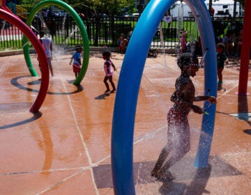 Spray parks, like this one in Washington, D.C., have become popular places for people to cool off in the heat of summer. But this year, fears over the coronavirus mean that some cities are re-evaluating whether to keep them open.
