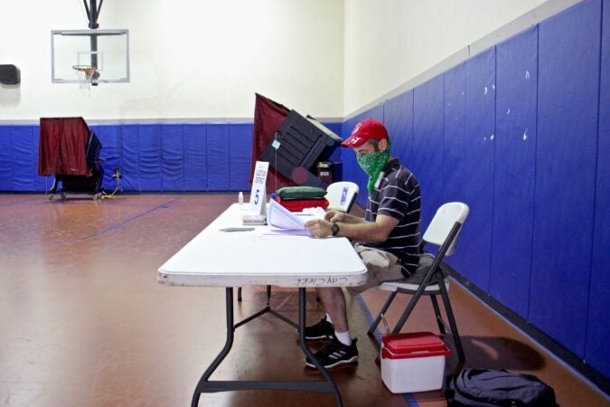 Poll worker Scott Zielinski