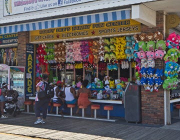 Wildwood People line up to play a water pistol game on the boardwalk in Wildwood, N.J.