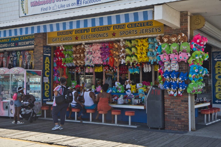 Wildwood People line up to play a water pistol game on the boardwalk in Wildwood, N.J.