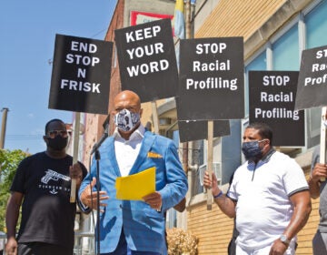 Will Mega of the Human Rights Coalition 215 stood with other activists outside Philadelphia Police’s 26th district precinct to demand an end to stop-and-frisk policies in the city. (Kimberly Paynter/WHYY)