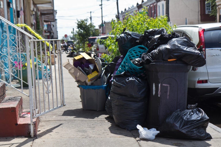 2020 7 16 k paynter trash collection delay-6 Some city residents say they are fed up with delayed trash collection. The city says sanitation workers are worked harder than ever, due to more people staying home and making more trash. (Kimberly Paynter/WHYY)