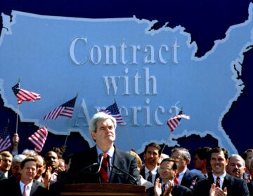 In this Sept. 27, 1994 photo, then-House Minority Whip Newt Gingrich of Ga., pauses while speaking to Republican congressional candidates on Capitol Hill during a rally where they pledged a 
