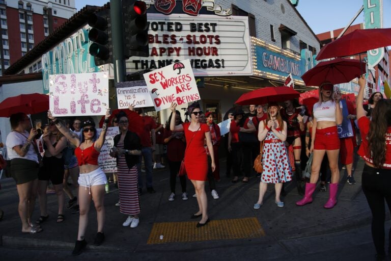 People chant as they march in support of sex workers, Sunday, June 2, 2019, in Las Vegas. People marched in support of decriminalizing sex work and against the Fight Online Sex Trafficking Act and the Stop Enabling Sex Traffickers Act, among other issues. (AP Photo/John Locher)