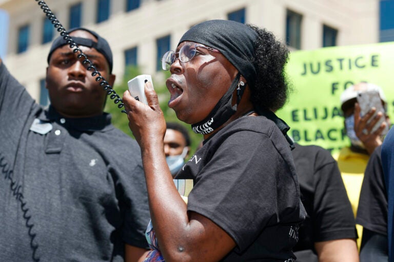 In this June 27, 2020, file photo, Sheneen McClain speaks during a rally and march over the death of her 23-year-old son Elijah McClain, outside the police department in Aurora, Colo. (AP Photo/David Zalubowski)