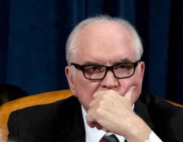 In this Feb. 7, 2019, file photo Rep. Mike Kelly, R-Pa., listens during a hearing on Capitol Hill in Washington. At least 10 lawmakers and three congressional caucuses have ties to organizations that received federal coronavirus aid, according to government data released this week. Among businesses that received money was a dealership owned by Kelly. (AP Photo/Jose Luis Magana, File)
