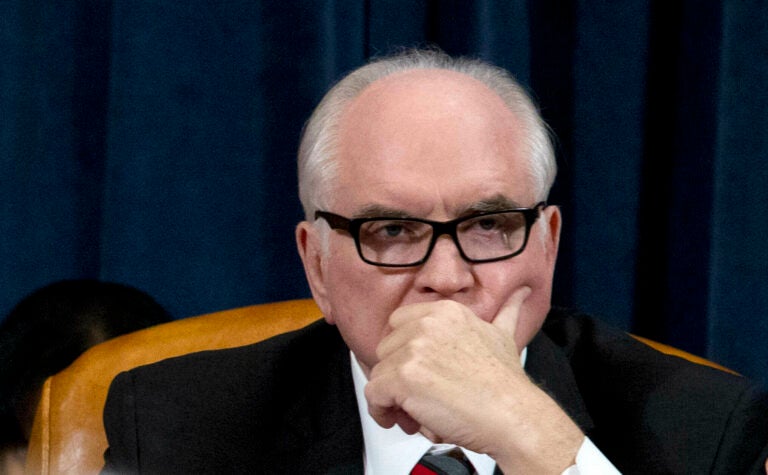 In this Feb. 7, 2019, file photo Rep. Mike Kelly, R-Pa., listens during a hearing on Capitol Hill in Washington. At least 10 lawmakers and three congressional caucuses have ties to organizations that received federal coronavirus aid, according to government data released this week. Among businesses that received money was a dealership owned by Kelly. (AP Photo/Jose Luis Magana, File)