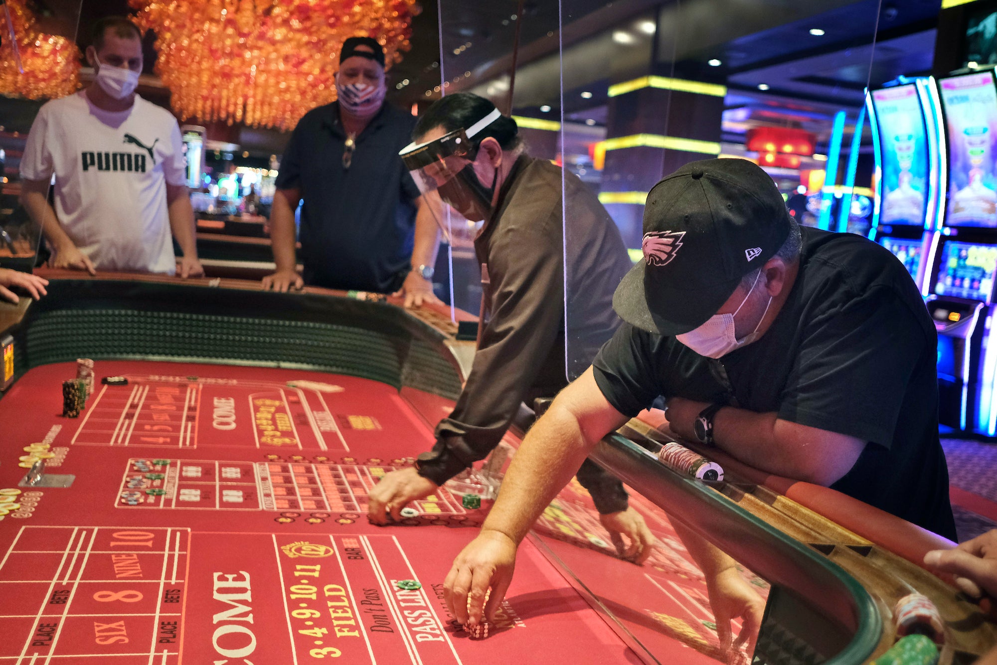 Craps players and dealers are seperated by partitions at the Golden Nugget Casino