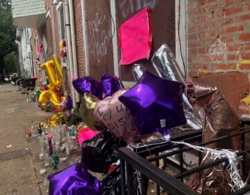 A memorial has been construction in honor or 19-year-old Nakysha Richardson, who was shot and killed July 6 on Pine Street. (Cris Barrish/WHYY)