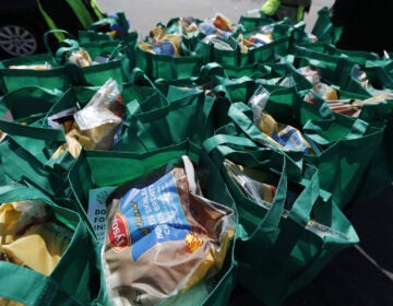 Bags of fresh food wait to be given away in Chicago in May. The number of malnourished people is expected to climb globally, according to the United Nations.
