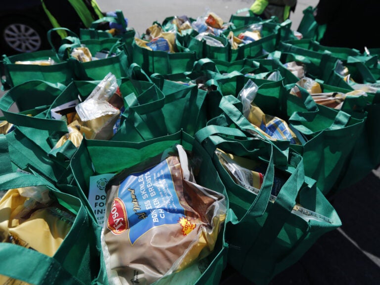 Bags of fresh food wait to be given away in Chicago in May. The number of malnourished people is expected to climb globally, according to the United Nations.