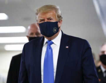 President Donald Trump wore a mask during his visit to Walter Reed National Military Medical Center in Bethesda, Md., on Saturday.