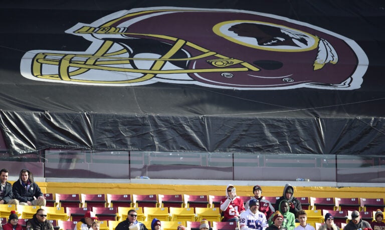 Fans sit in the stands before the start of a game between the New York Giants and Washington Redskins at FedEx Field in 2019 in Landover, Md. The Redskins, and other teams, are reviewing their names. (Patrick McDermott/Getty Images)