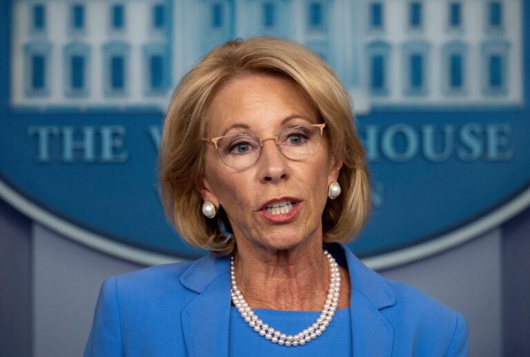 Education Secretary Betsy DeVos, seen here during a White House briefing in March, will participate in a panel discussion Tuesday on how to reopen America's schools safely. (Jim Watson/AFP via Getty Images)