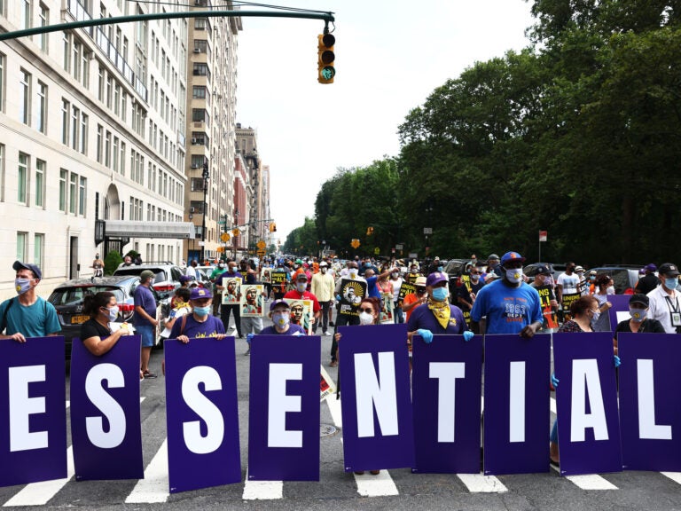 Members of the 32BJ union participate in a 