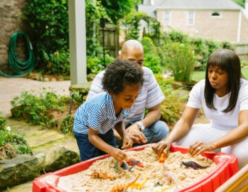 Spending quality time with kids and listening deeply to them is one way to help them tame anxiety. Here Mariano Noesi and Maryam Jernigan-Noesi play with their 4-year-old son Carter. Jernigan-Noesi is a child psychologist. (Lynsey Weatherspoon for NPR)