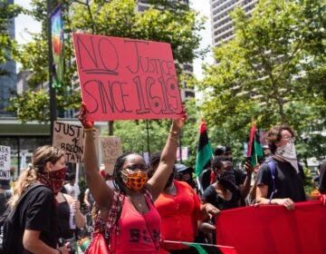 Protesters held a rally for reparations and racial justice on the Fourth of July outside Philadelphia’s Municipal Services building. (Kimberly Paynter/WHYY)