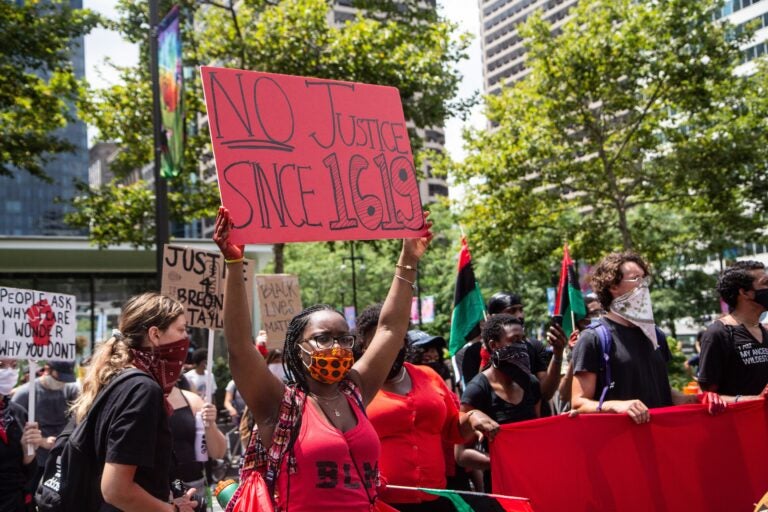 Protesters held a rally for reparations and racial justice on the Fourth of July outside Philadelphia’s Municipal Services building. (Kimberly Paynter/WHYY)