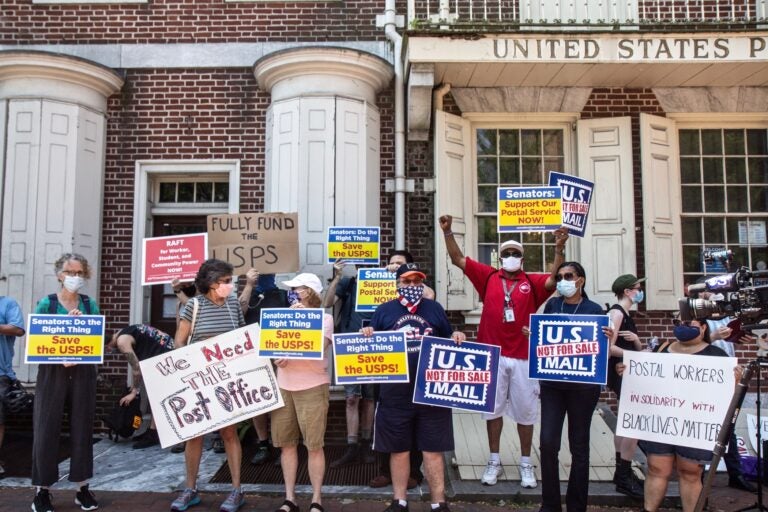 Members of the American Postal Workers union local 89 protest in Old City on June 22, 2020, demanding the postal service be fully funded. (Kimberly Paynter/WHYY)