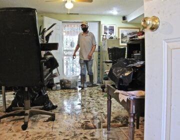 File photo: Flood water from Darby Creek rose to nearly four feet inside Leo Brundage's Eastwick home after Tropical Storm Isaias struck. (Emma Lee/WHYY)