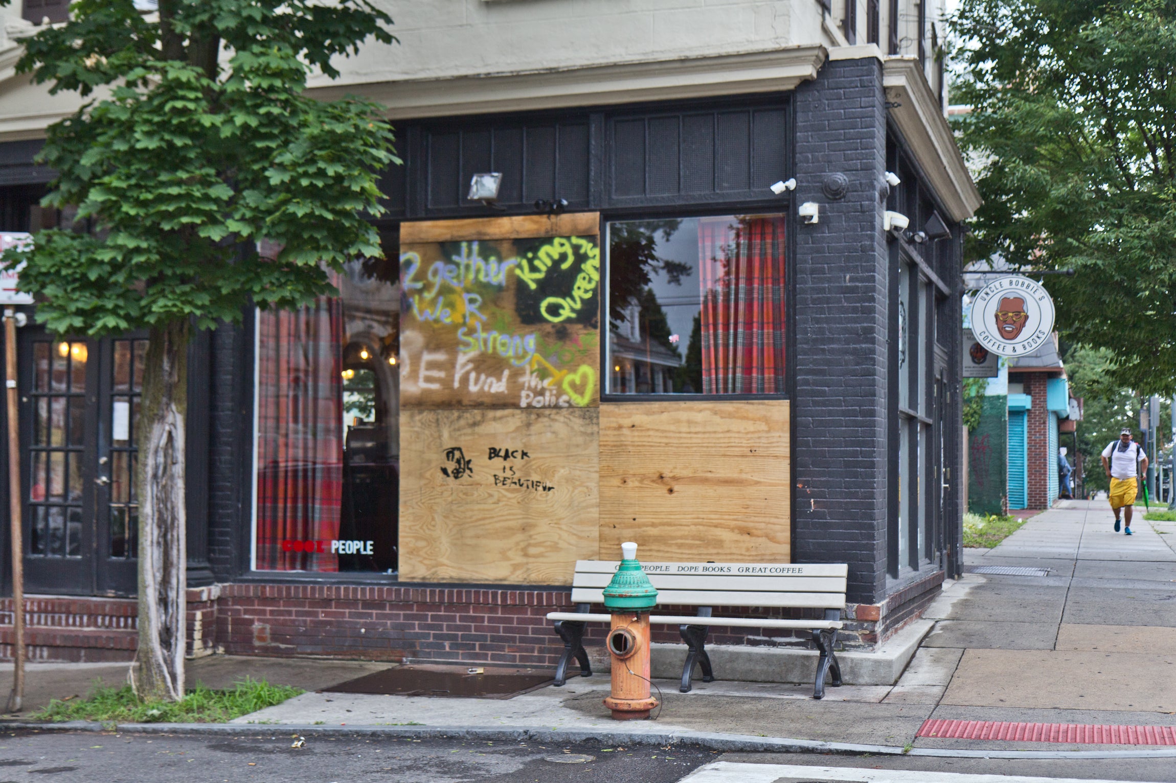 Boarded up windows at Uncle Bobbie’s Coffee and Books in Germantown