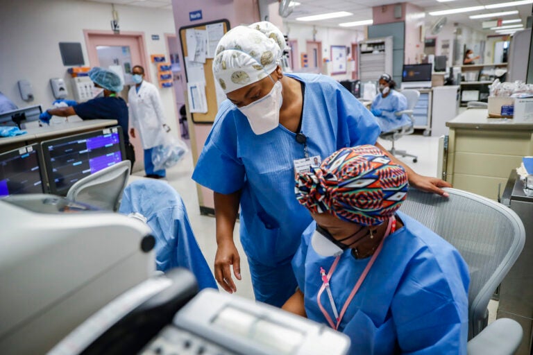 Medical personnel work in the emergency department at NYC Health + Hospitals Metropolitan