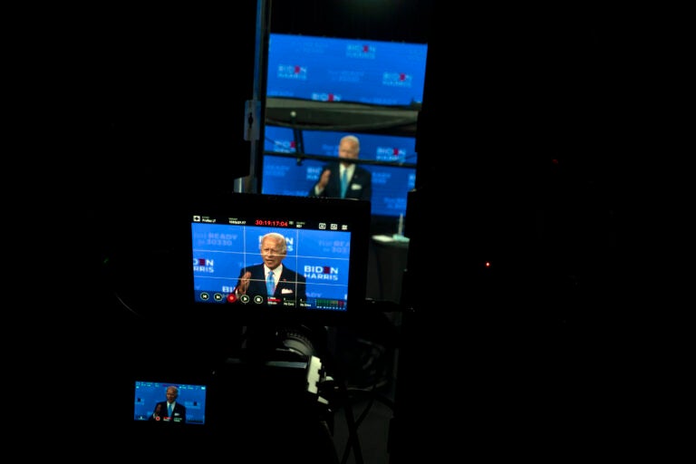 In this Aug. 12, 2020, file photo Democratic presidential candidate former Vice President Joe Biden is seen on monitors as he speaks during a virtual grassroots fundraiser at the Hotel DuPont in Wilmington, Del. As Democrats gather virtually this week to nominate Joe Biden for the presidency, party leaders and activists across the political spectrum agree on one unifying force: their desire to defeat President Donald Trump. (AP Photo/Carolyn Kaster, File)