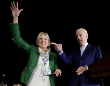 In this Mar. 3, 2020, file photo, Democratic presidential candidate former Vice President Joe Biden, right, and his wife Jill attend a primary election night rally in Los Angeles. (AP Photo/Marcio Jose Sanchez)