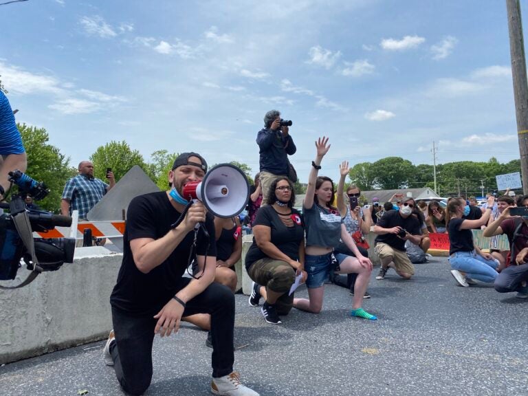 Amaury Abreu speaks about George Floyd, his own faith, and the need for action outside Lebanon's municipal building in June. (Alanna Elder/Keystone Crossroads)