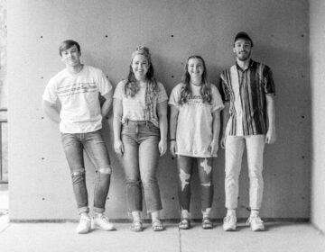 A black and white photo of the band Benson, comprised of siblings Brianna, Hudson, Schyler and Haley Marsh