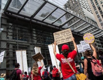 Protesters attempted to deliver a petition to Comcast for free internet for Philadelphia school district students learning virtually on Aug. 3, 2020. (Kimberly Paynter/WHYY)