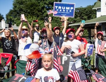 Trump fans excitedly greeted his motorcade as he campaigned in Old Forge, Pa., Thursday. (Kimberly Paynter/WHYY)