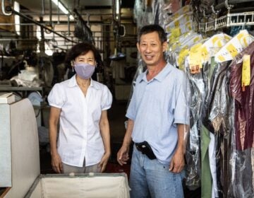 Soo and James Lee, owner of Lee’s Best Dry Cleaning in Upper Darby, said they had experienced flooding like that caused by Isaias only twice in 21 years of business. (Kimberly Paynter/WHYY)