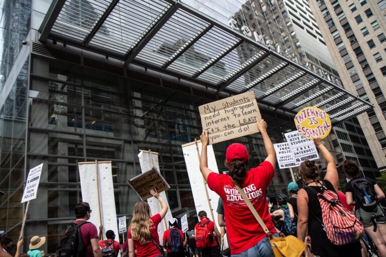 Protesters attempted to deliver a petition to Comcast for free internet for Philadelphia school district students learning virtually on Aug. 3, 2020. (Kimberly Paynter/WHYY)