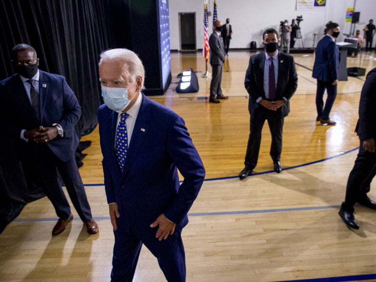 Former Vice President Joe Biden leaves a campaign event last month in Wilmington, Del. If Biden wins the election, he may face political pressure over what to do about President Trump. (Andrew Harnik/AP)
