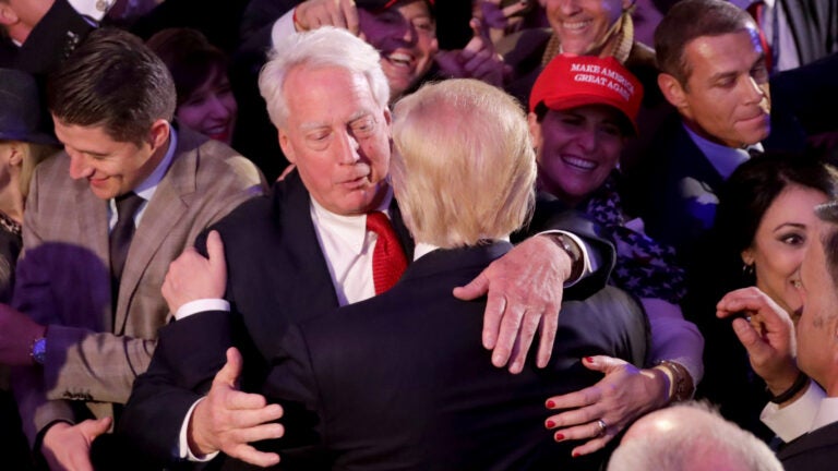 Republican president-elect Donald Trump hugs his brother Robert Trump