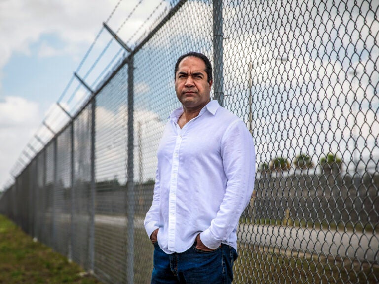 Kareen Troy Troitino, a guard at the Federal Correctional Institution, stands outside the Miami facility in April. (Scott McIntyre for The Washington Post via Getty Images)