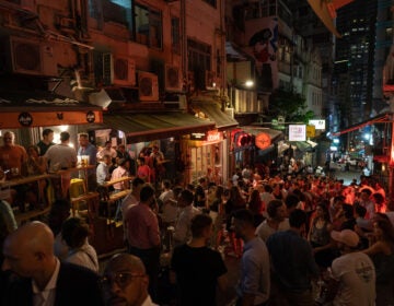 After shuttering bar districts early in the pandemic, Hong Kong reopened them in May. Some have been linked to new clusters of cases. (Roy Liu/Bloomberg via Getty Images)
